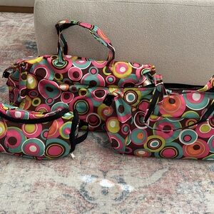 Three piece weekender roller bag set